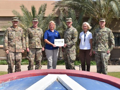 U.S. Army Central Operational Engineers awards Mary Kate DeWolf a Certification of Appreciation